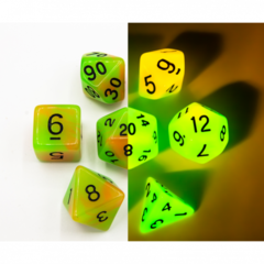 Green/Orange Set of 7 Fusion Glow In Dark Polyhedral Dice with Black Numbers